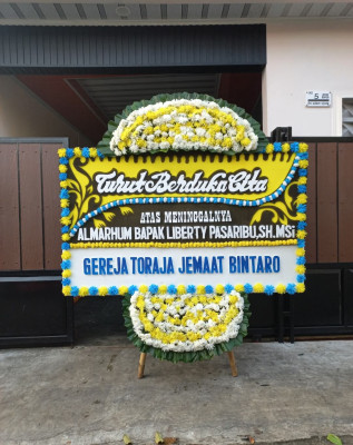 Papan Bunga Duka di Gombang